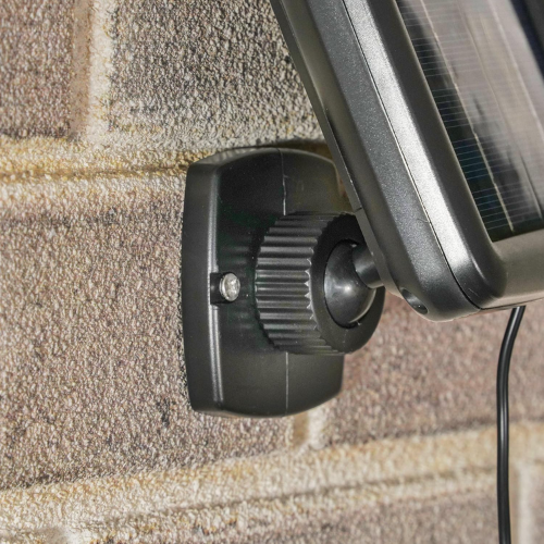 Solar pond spotlight set used to light a waterfall feature