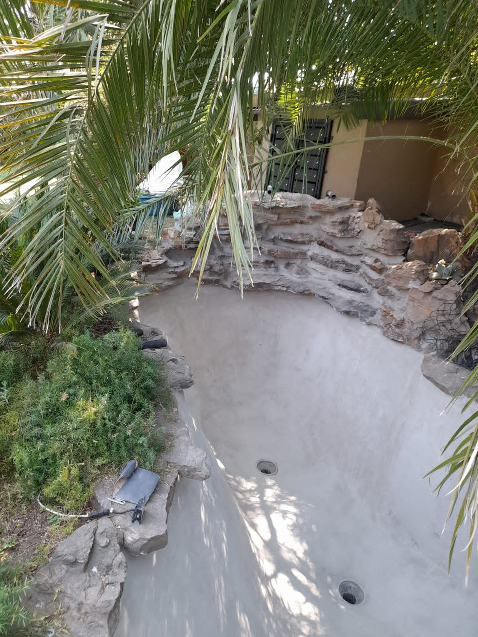 EcoCrete Fish Pond Concrete Primer applied to koi pond